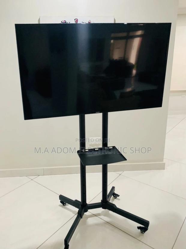 Anti-Rust Moveable Tv Trolly for 32” to 70 Inch Tv,Black. · Photo 2