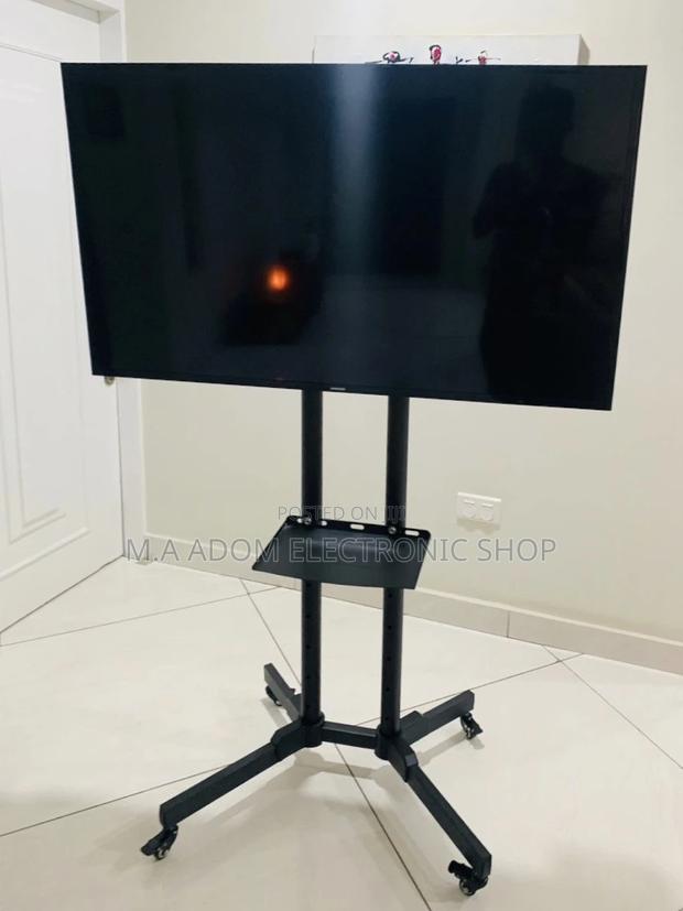 Affordable Moveable(Black)Tv Trolly for 32-70 Inch Tv. · Photo 2