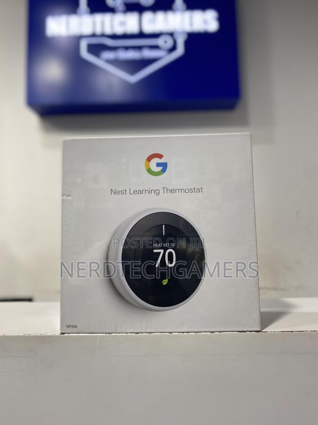 Goggle Nest Learning Thermostat · Photo 4