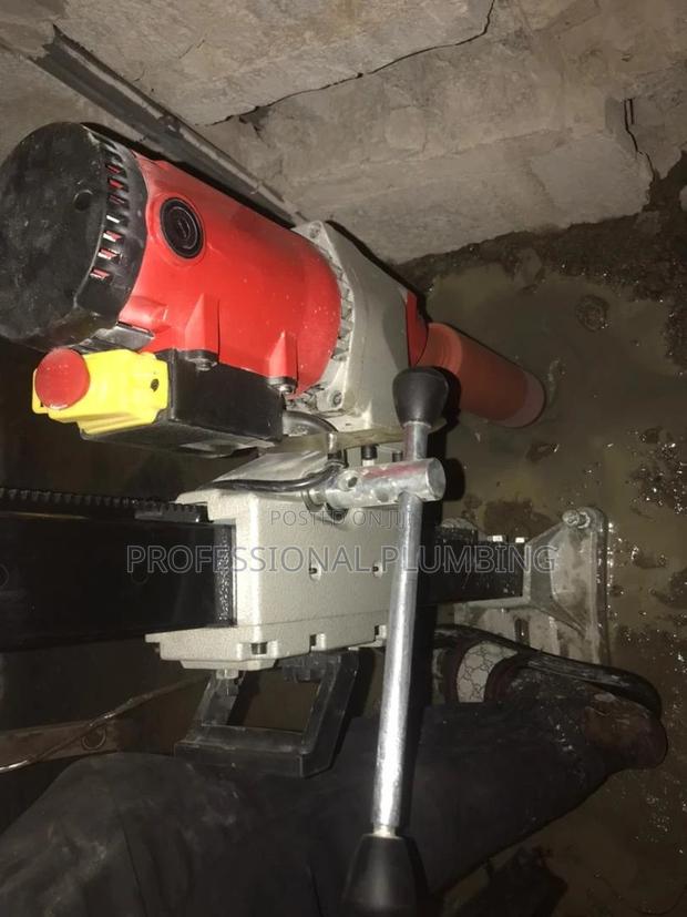 Core Drilling Holes for a/C and Plumbing photo 7