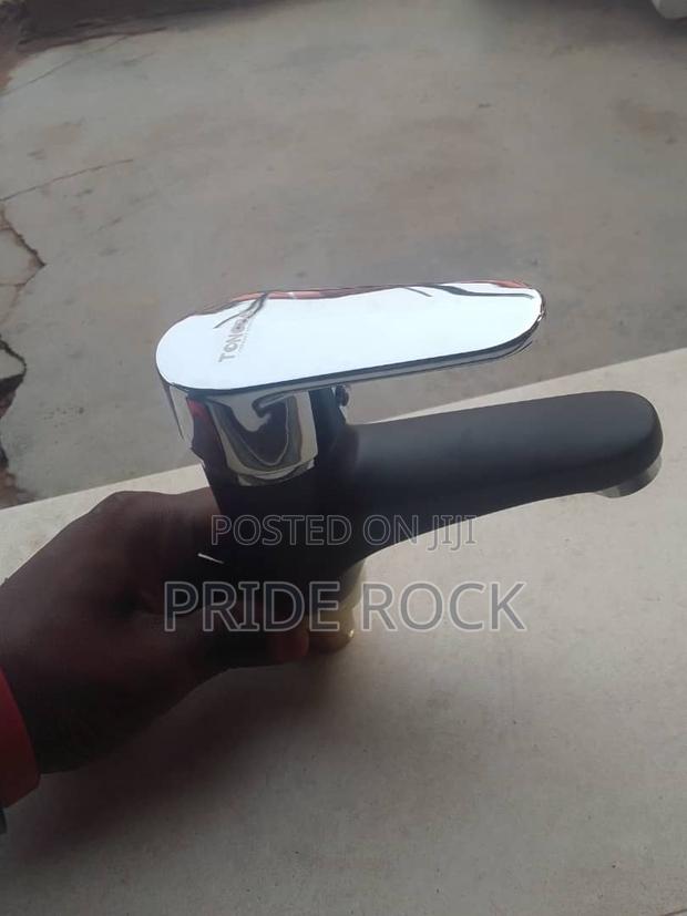 Black and Chrome Single Lifted Black and Chrome Basin Tap · Photo 4