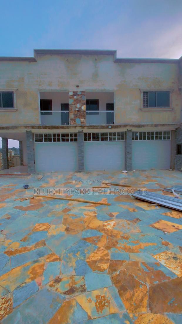American Triple Automatic Garage Doors · Photo 4