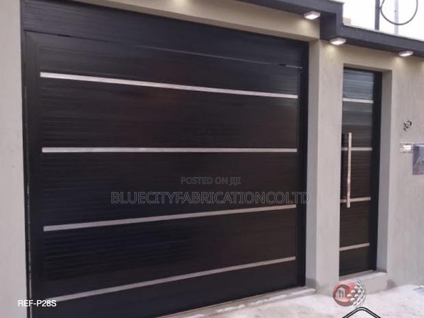 Black and White Design Garage Doors and All White Available · Photo 3