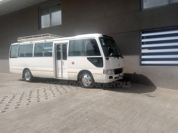 Car Rental- 29 Seats Bus- Toyota Coaster Bus for Rent · Photo 3