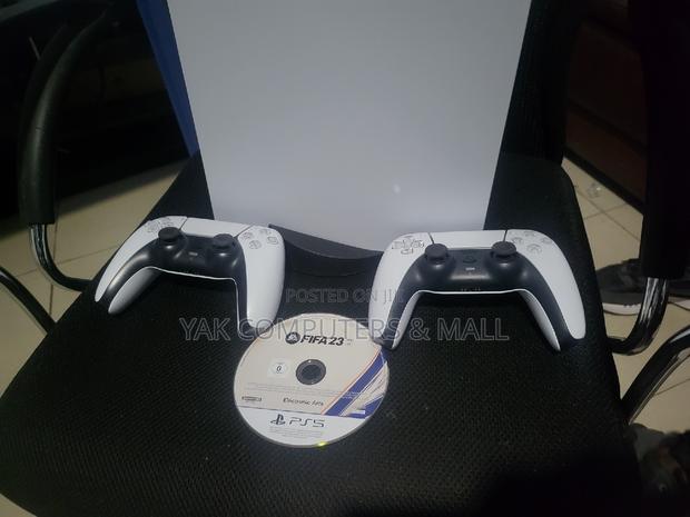 Ps5 With 2 Controllers and Fifa 23 Cd