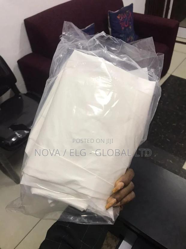 White Quality Surgical Gown Polythene Waterproof