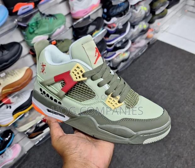 Air Jordan 4 Sneakers Shoe Kick · Photo 3
