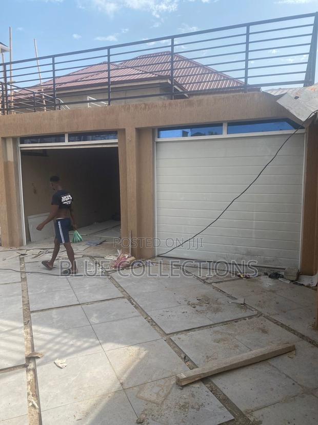 Double Garage Doors · Photo 3