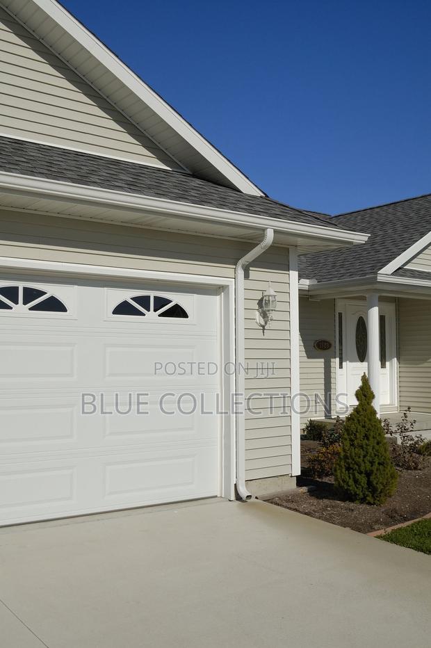 Canada Automated Garage Door With Remote and Fanlight · Photo 2