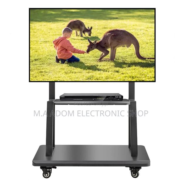 Mobile Tv Stand for Tv Between 32”-75” · Photo 2