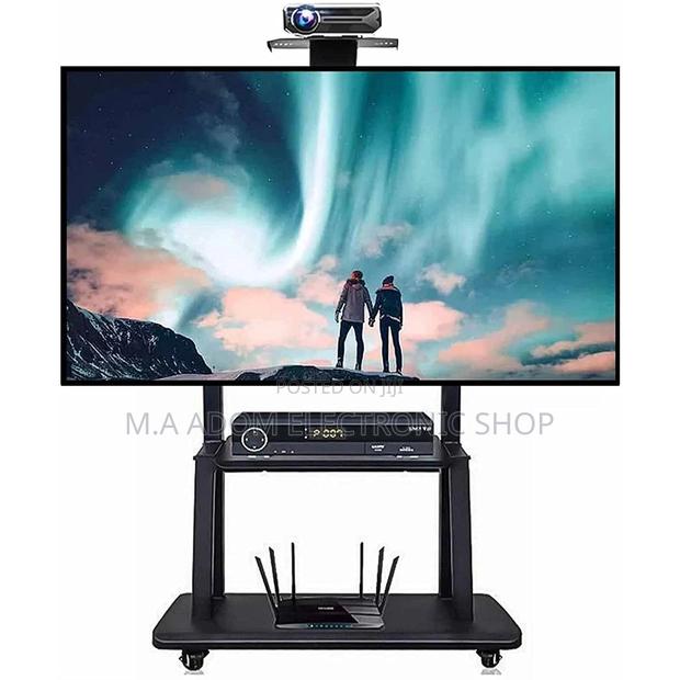 Tv Stand for Large Screen Between 65”-75” · Photo 2