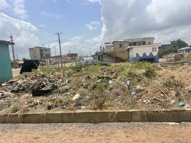A Main Roadside Plot for Sale From Botwe SCH to Melcom · Photo 1