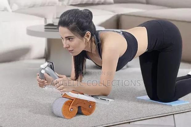 Automatic Rebound Abdominal Muscles Wheel · Photo 2