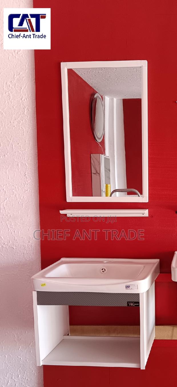 Suspended Basin With Mirror and Glass Stand · Photo 3