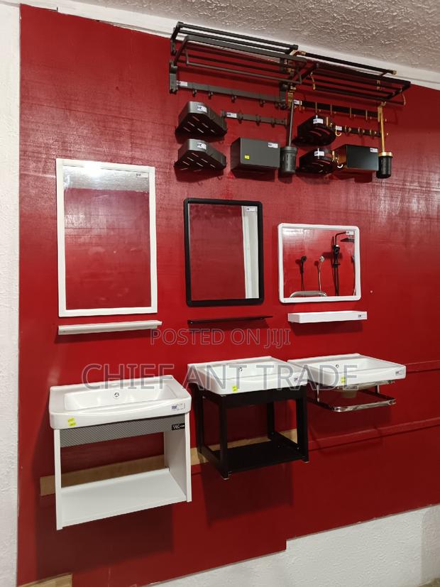 Suspended Basin With Mirror and Glass Stand · Photo 4