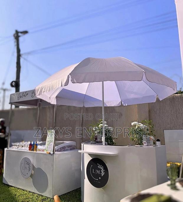 Plain White Parasol Umbrellas · Photo 4
