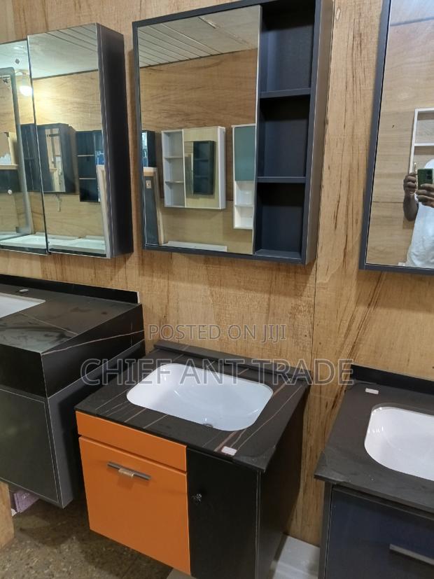 Pink Cabinet Basin With Mirror · Photo 4