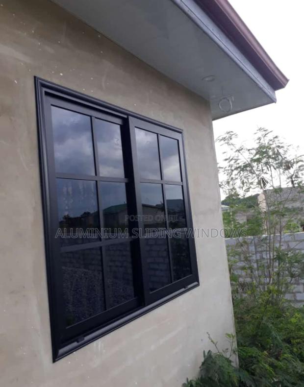 Aluminium Sliding Window Black Frame and Dark Glass