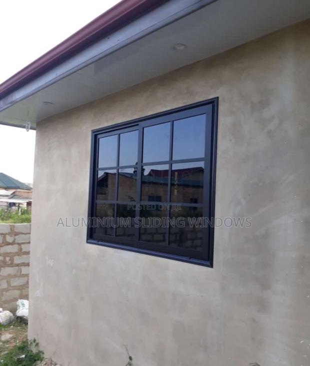 Aluminium Sliding Window Black Frame and Dark Glass photo 3