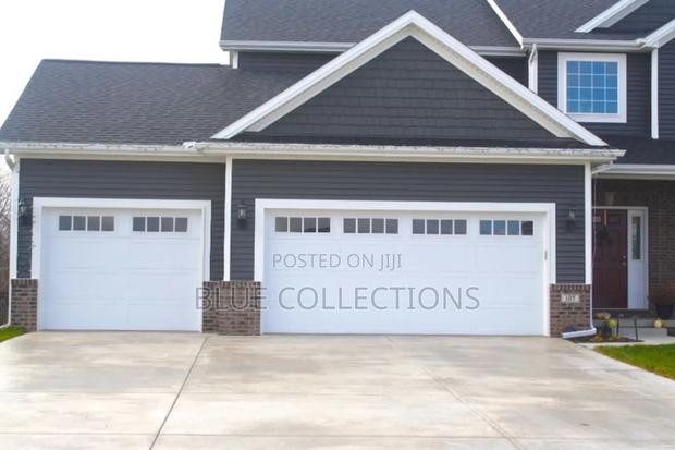 14×8 Automated Garage Door With Fanlight · Photo 2