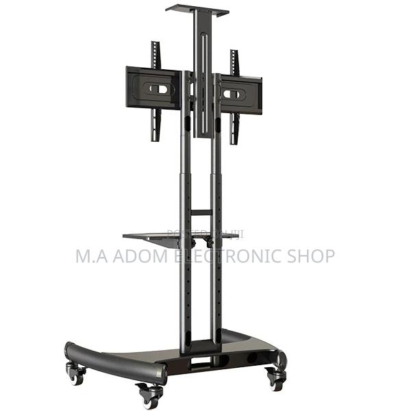 Movable Tv Trolley for TVS Between 32”-75” · Photo 2
