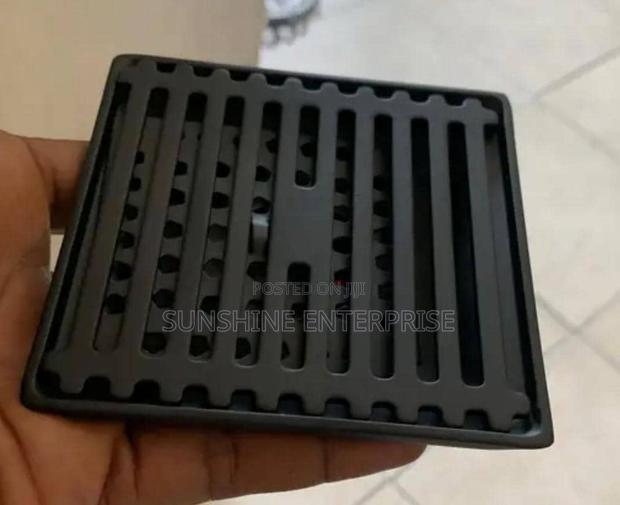 All Black Bathroom Floor Drain · Photo 2