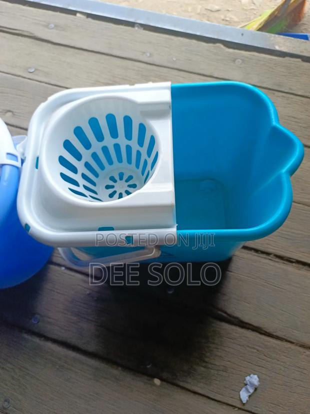 Cleaning Mop Buckets photo 2