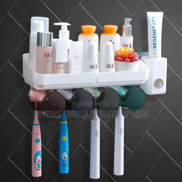 Latest Toothpaste Dispenser Toothbrush Holder With Cups · Photo 2
