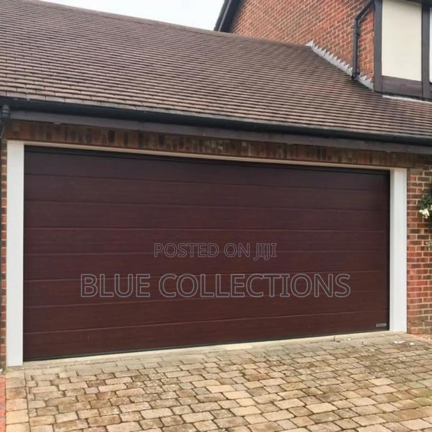 14×8 Imported Automated Garage Door · Photo 2