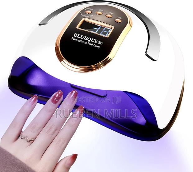 Hands in Lights on Automatic Sensor Professional Nail Dryer · Photo 4