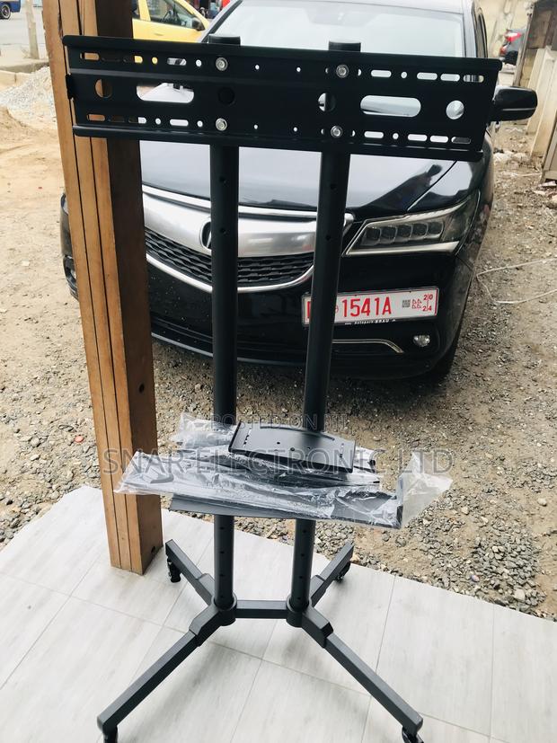 Highly Efficient TV Stand With Wheels Height Adjustable · Photo 2
