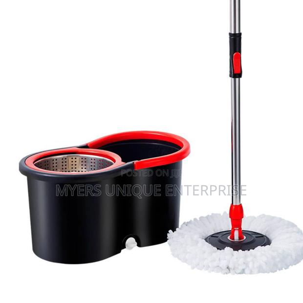 Easy to Use 360 Spin Mop Bucket With 2 Mop Heads · Photo 2