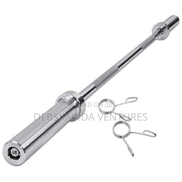 7ft Standard Olympic Bar 750lb Load Capacity · Photo 4