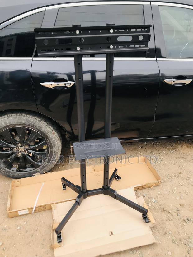 Affordable Mobile TV Stand Rolling Movable for Most 32"-70 · Photo 2