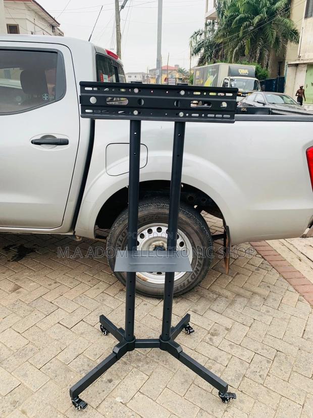 Shop Affordable Mobile Tv Stand With Wheels for 32”-70” Tv. · Photo 2