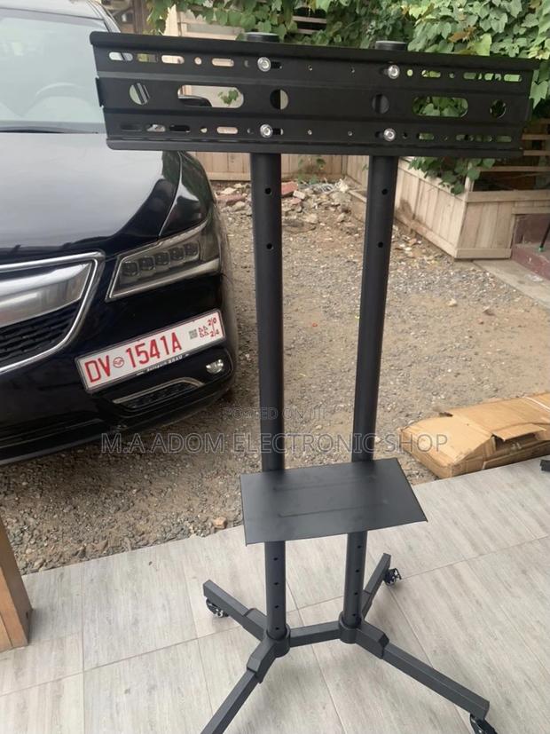 Buy Affordable Mobile Tv Stand With Wheels for 32”-70” Tv. · Photo 2