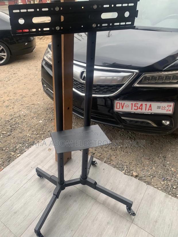 Purchase Affordable Moveable Tv Trolly for 32”-70” Tv. · Photo 2