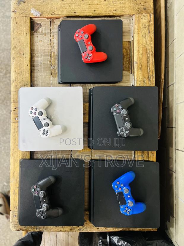Playstation Four (Ps4) Slim With Games Installed photo 4