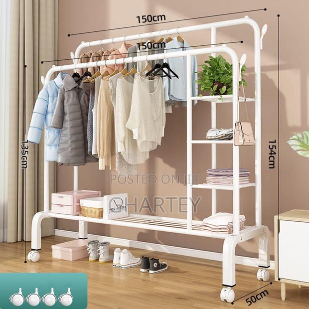 Double Metal Hanging Rail Clothes Rack With Shelves White · Photo 4