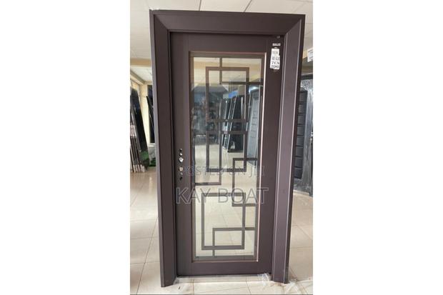 A Harmonious Glass Metal Door · Photo 2