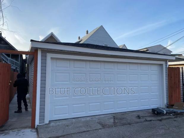 16× 8 Automatic System Garage Door · Photo 2