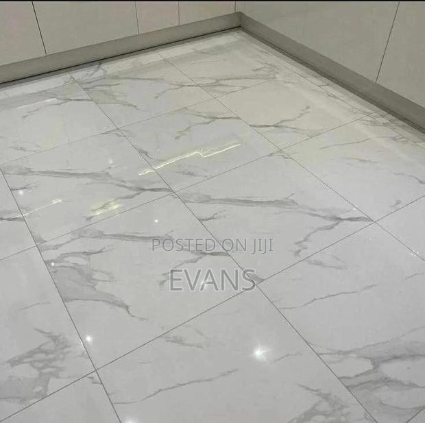 Floor Level Tilling · Photo 2
