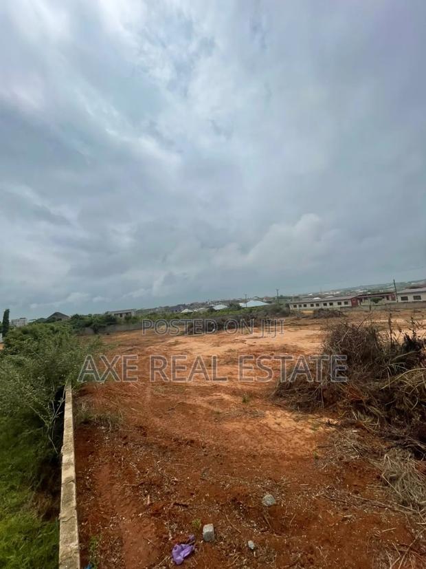 Neat Fast Developing Location! Half Plot at Tema Community 25 · Photo 3