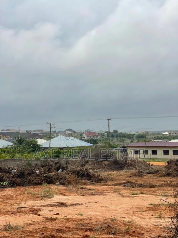 Neat Fast Developing Location! Half Plot at Tema Community 25 · Photo 4