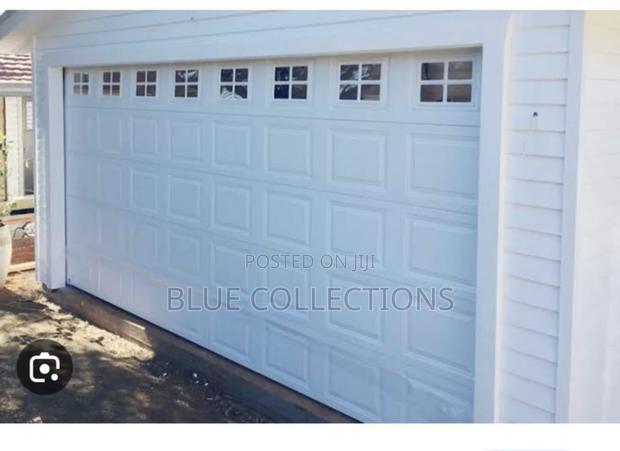 9×8 Garage Door With Fanlight and Remote · Photo 2