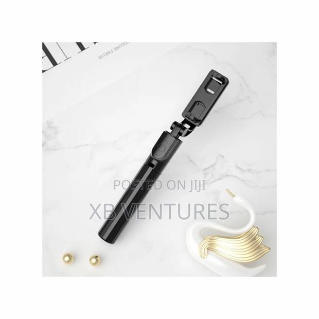 Bluetooth Selfie Stick Tripod + Shutter Remote Control photo 5