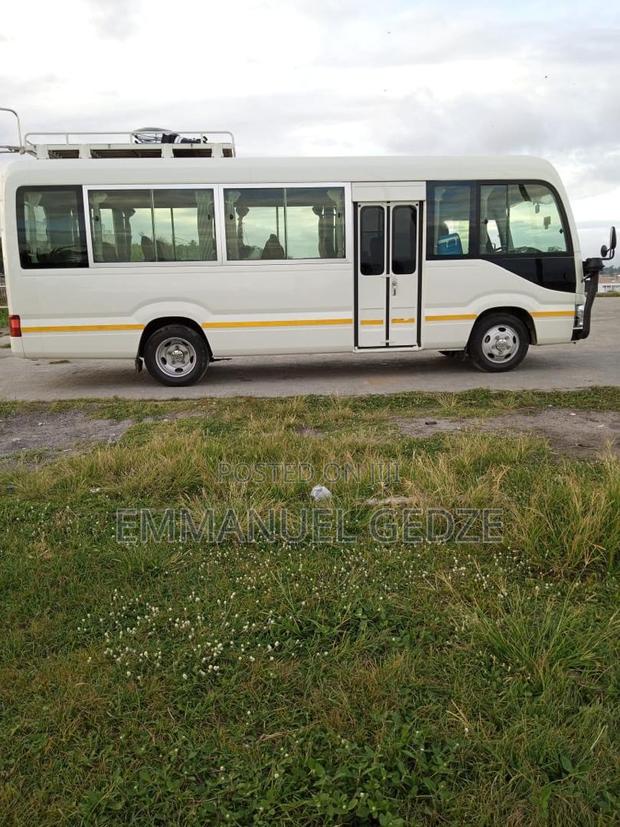Coaster Bus Rental - New Type (30 Seater) · Photo 3