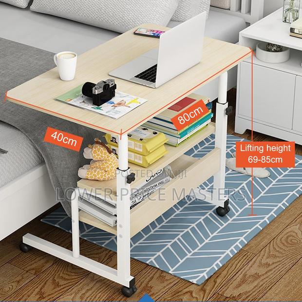 Adjustable 80x40cm Table · Photo 1