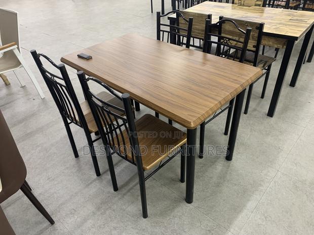 Wooden Dining Table With 4 Chairs · Photo 2