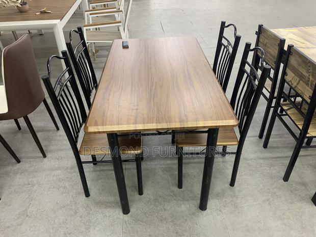 Wooden Dining Table With 4 Chairs · Photo 3
